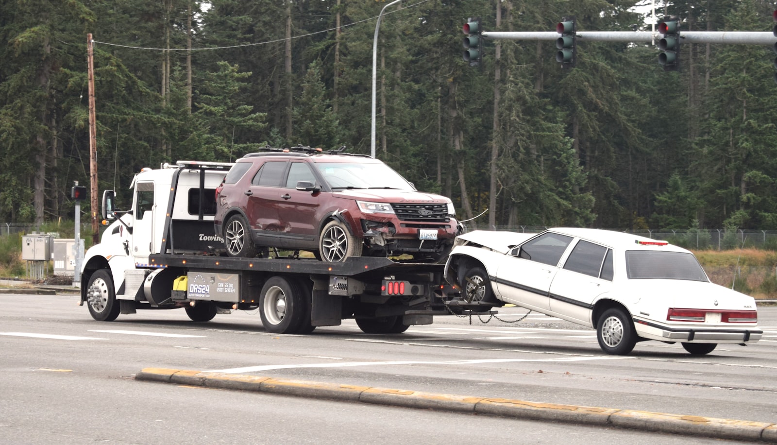 Tow truck recovering vehicles